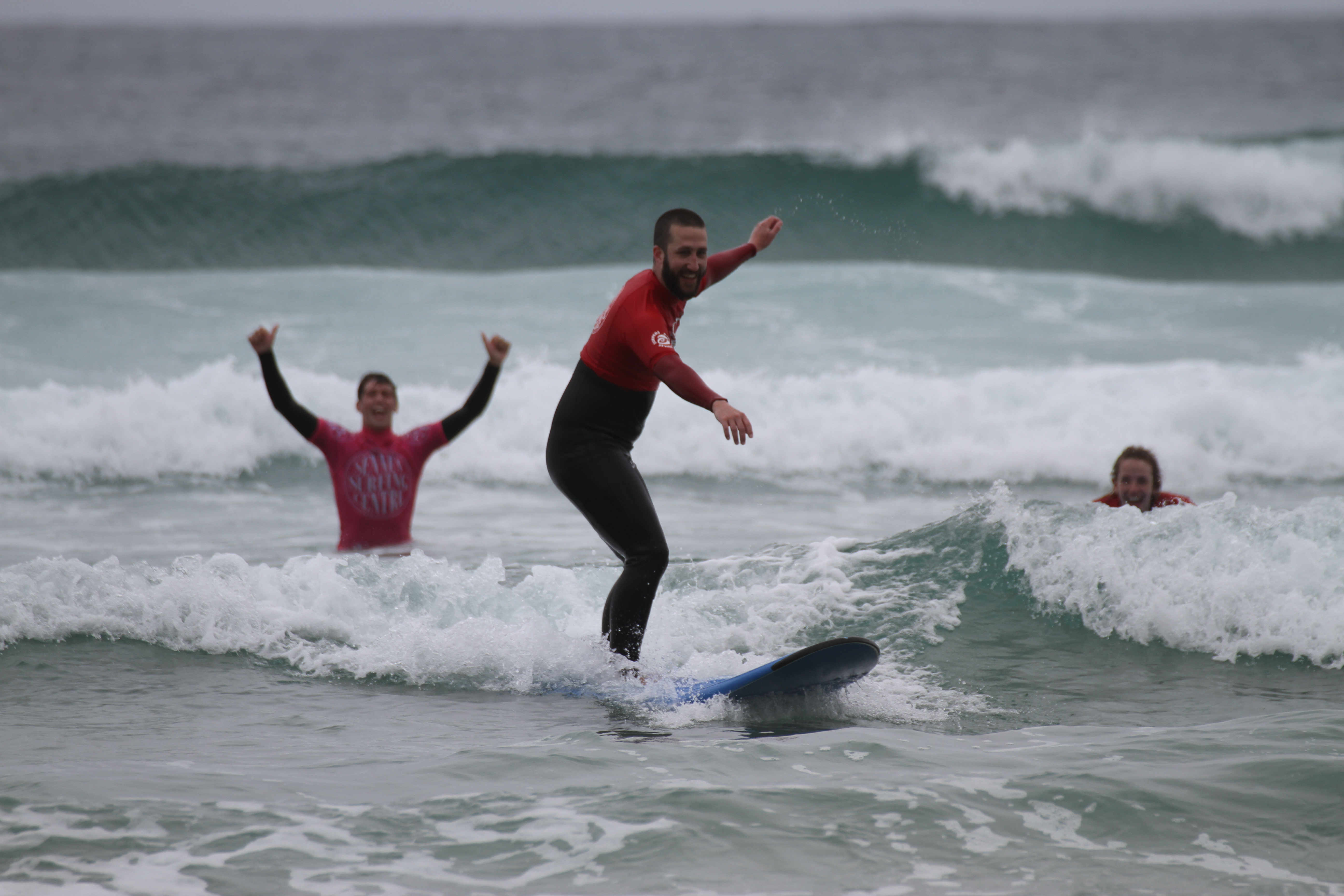 Sean manages to ride a wave